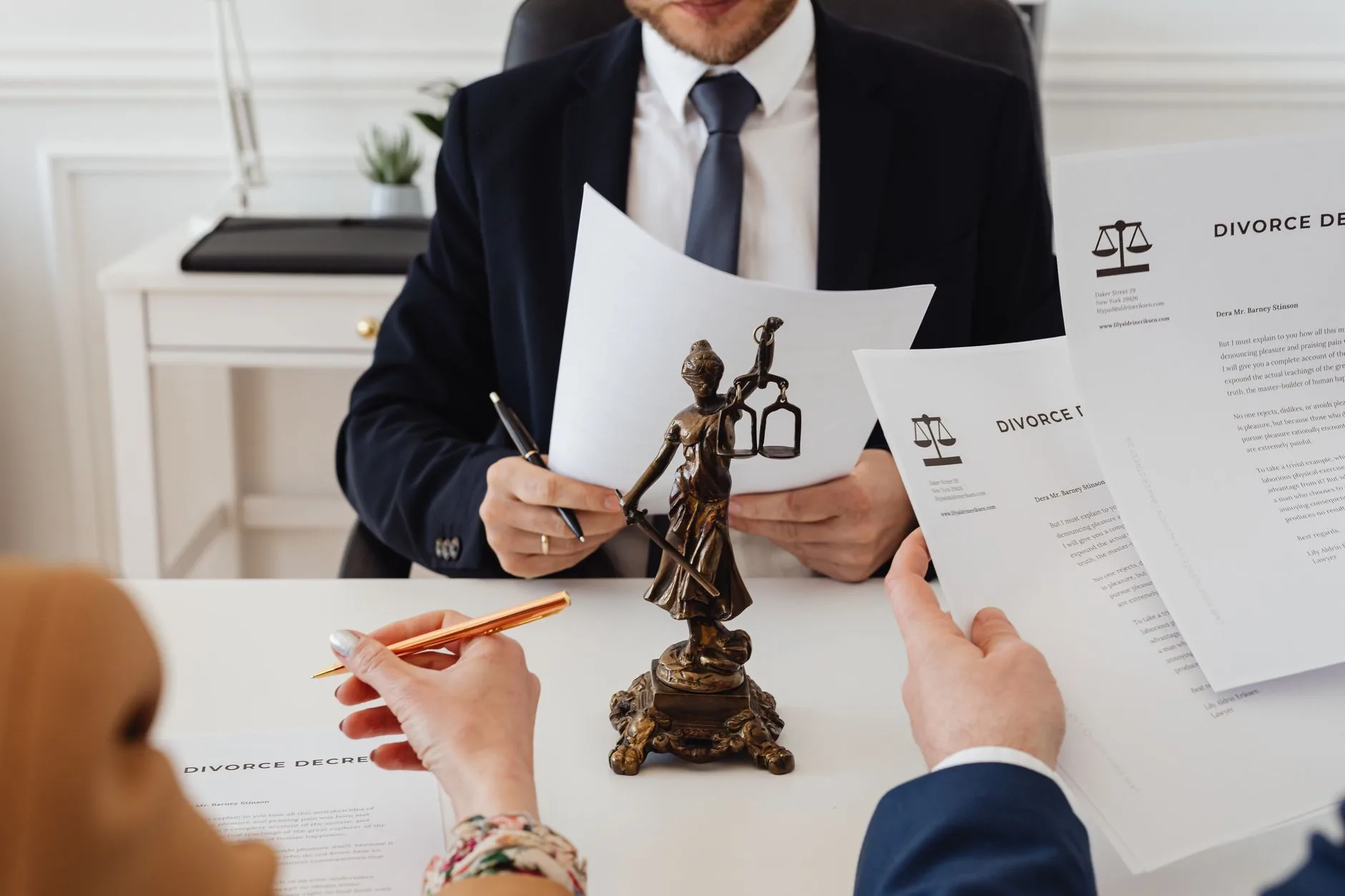 A veteran in a suit at a tidy desk, veterans benefits administration official support channels.